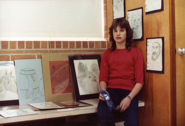 An unknown girl with her project at the Pathfinder Education Fair in Little Rock, AR