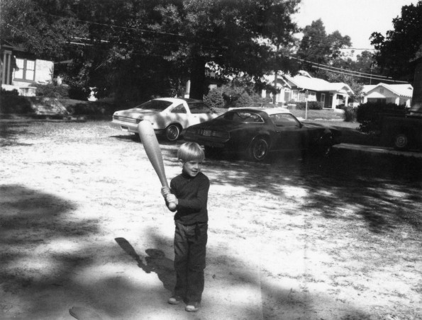 A student playing baseball at the Monroe Adventist School