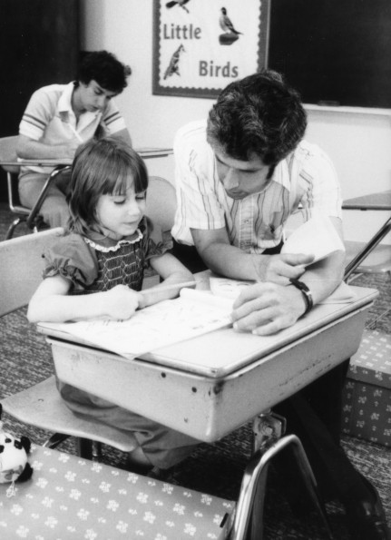 Mark Gutman assisting a student at Lafayette Seventh-day Adventist Church School