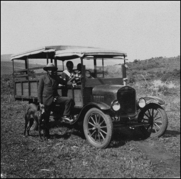 Kisii natives with an automobile