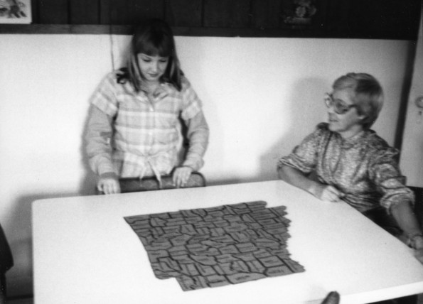 Ruby Edwards assisting a student at Four Oaks Christian School