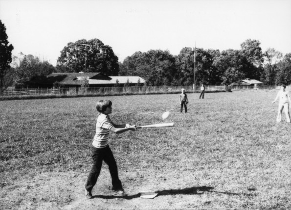 Students playing baseball at the Bentonville Seventh-day Adventist School