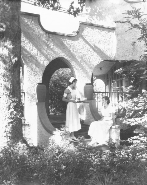 [Ellen Low serving an unknown woman at Madison Sanitarium]