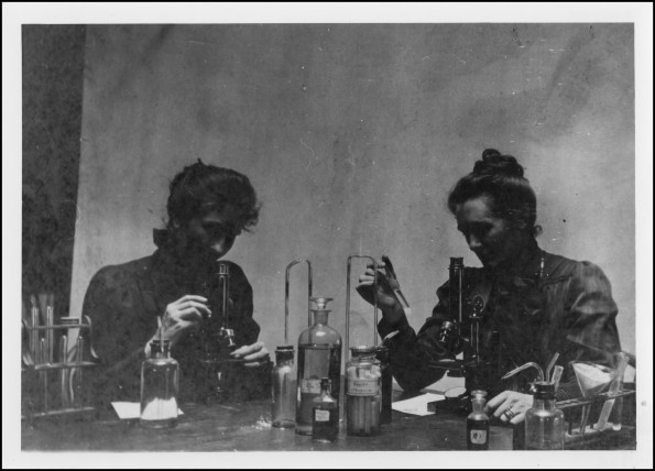 Unknown women with microscopes associated with Battle Creek College
