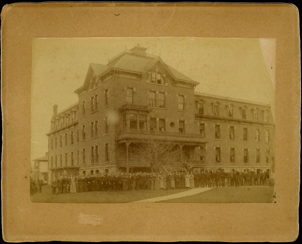 Battle Creek College student body in front of West Hall, probably during the Prescott regime