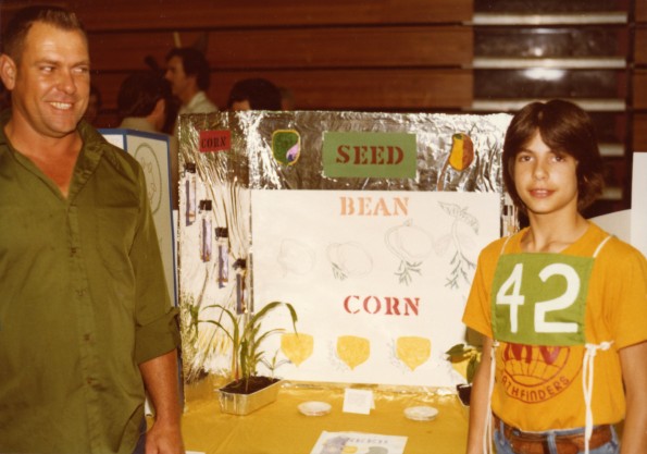 Tony Shaffet with an unknown man standing with his project at the Pathfinder Education Fair in Bossier City, LA