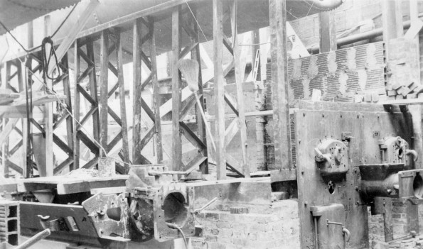 Installing central heat during the construction of an unknown building at Madison College