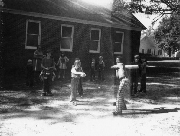 Grace Pitcher and her students at the Crescent City Adventist School