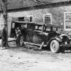 [Unknown people working on the Madison College school bus at the Machine and Repair Shop