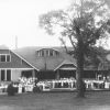 The entire student body and faculty in front of the Helen Funk Assembly Hall at Madison College