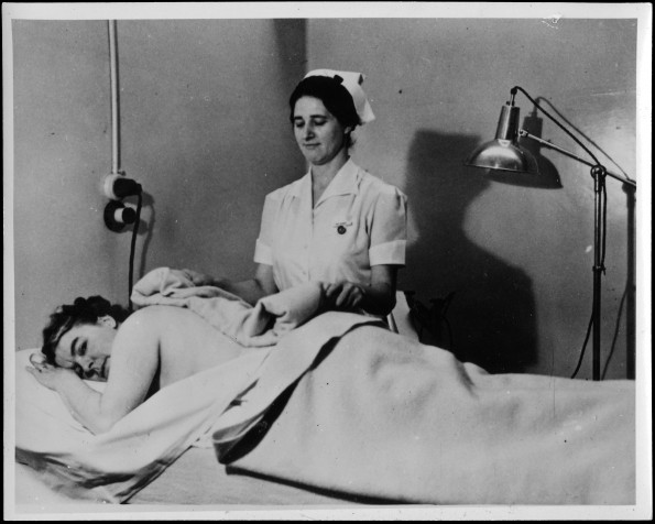 Nurse treating a patient at Stanborough Park, Watford