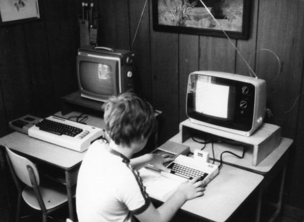 A student using a computer at the Four Oaks Christian School
