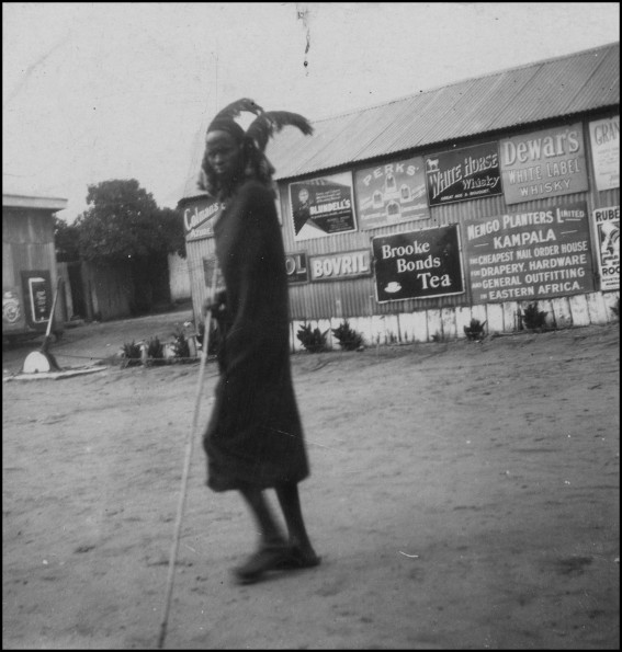 Tall Masai who has strayed onto frontiers of civilization seen at one of the stations on the Kenya and Uganda Railway