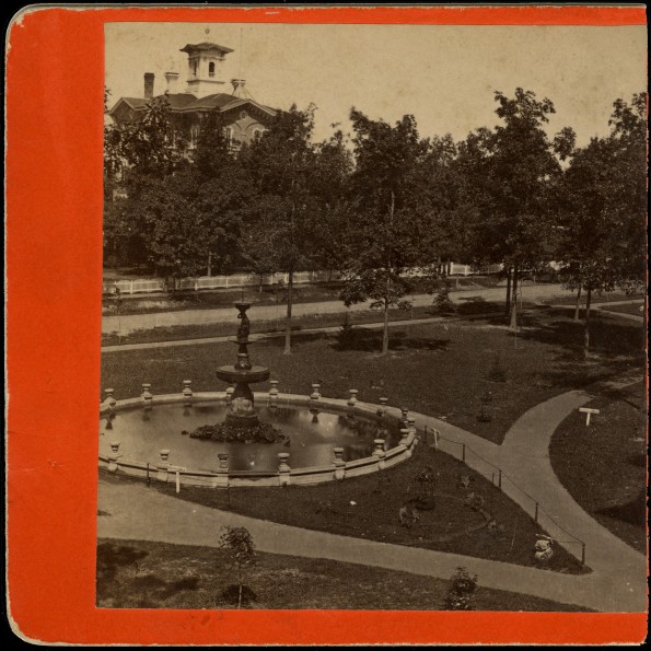 Battle Creek views :|bBattle Creek Sanitarium fountain with Battle Creek College building in the background, cut in half