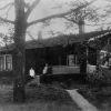 Two unknown women at one of the Teacher's Cottages at Madison College