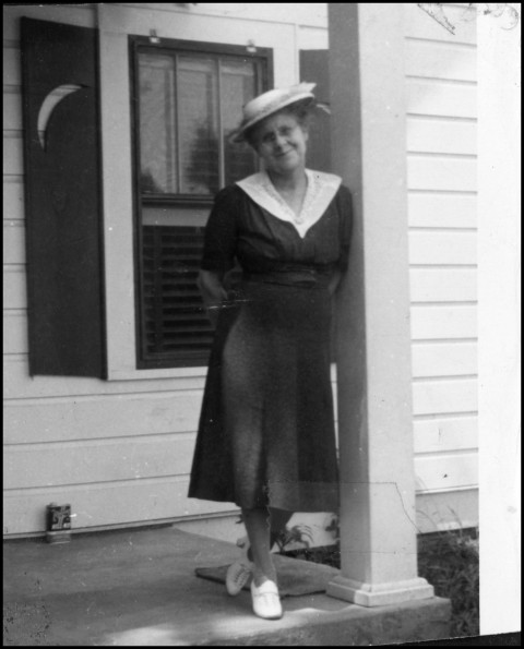 Mertie Bralliar leaning against a pillar