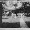 Unknown people, possibly in front of Lida Scott's house