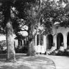 Two unknown women in front of one of the buildings at Madison Sanitarium