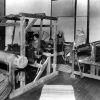 Three unknown women working in the Weaving and Sewing Room at Madison College in Madison, TN